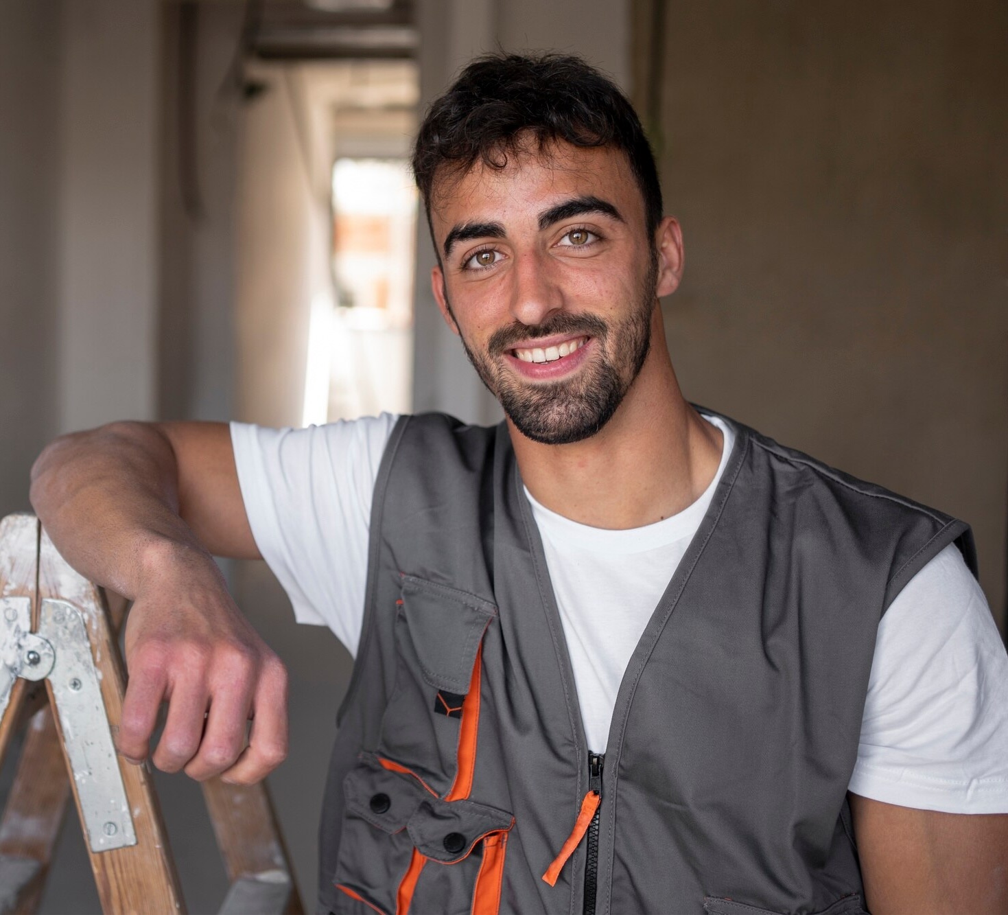 medium-shot-smiley-worker-wearing-vest_23-2149366622
